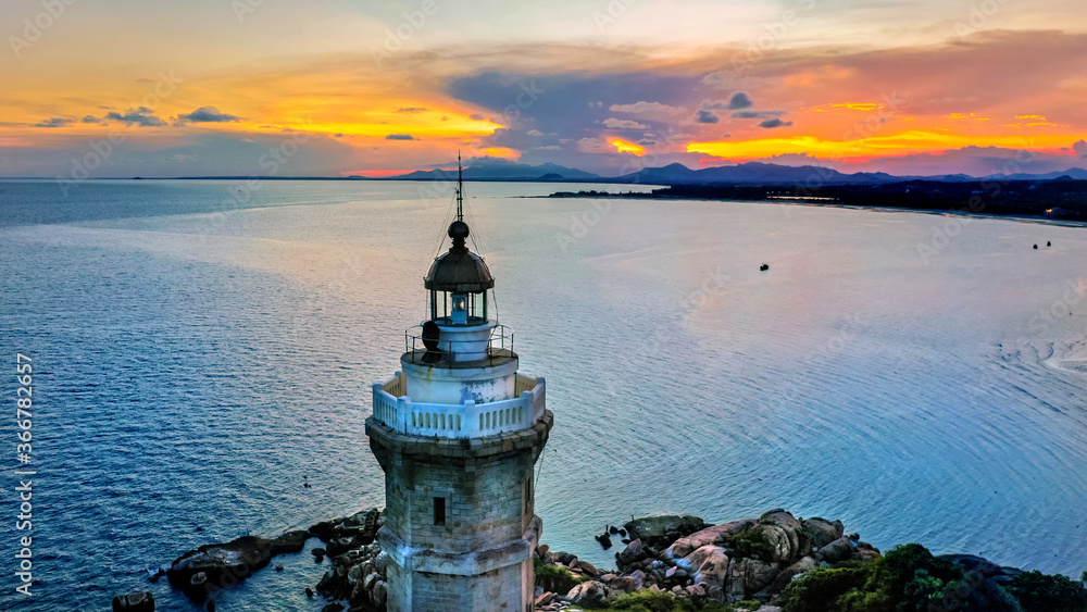 Ke Ga lighthouse at sunset in Vietnam. Ocean view landscape. Drone aerial photo