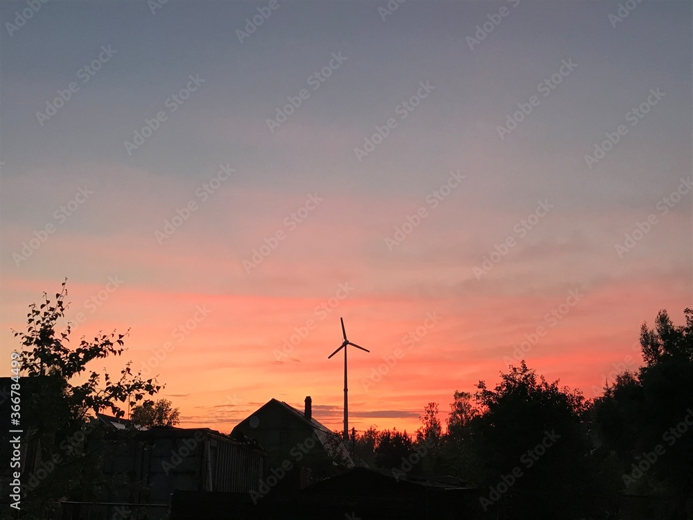 Obraz premium wind turbine sunset