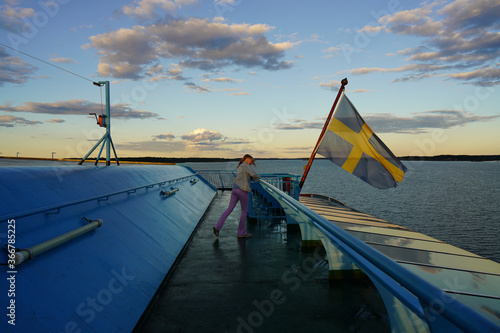 Quadro em tela Young girl on a ferry between Stocholm and Turku