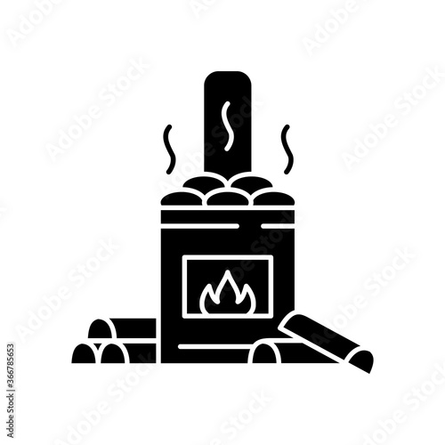 Wood burning sauna black glyph icon. Traditional russian banya, finnish bathhouse heat source silhouette symbol on white space. Fireplace with hot spa stones and firewood vector isolated illustration