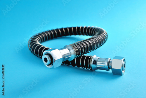 brake hose for a truck, car accessories, auto parts, car brake system parts on a blue background