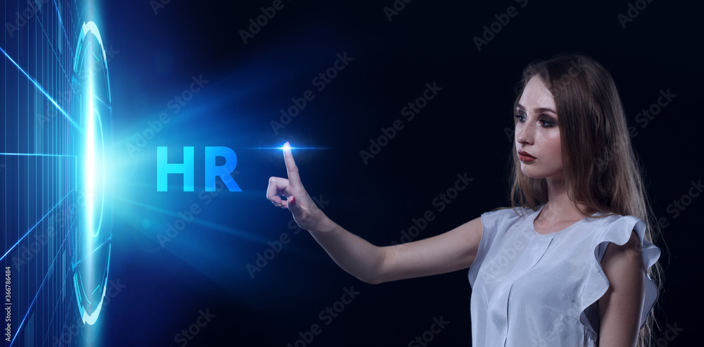 Business, Technology, Internet and network concept. Young businessman working on a virtual screen of the future and sees the inscription: HR Business, Technology, Internet and network concept. Young businessman working on a virtual screen of the future and sees the inscription: HR
