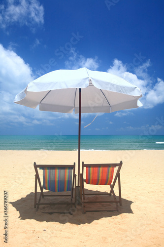 Fototapeta Naklejka Na Ścianę i Meble -  beach chairs and umbrella on the beach