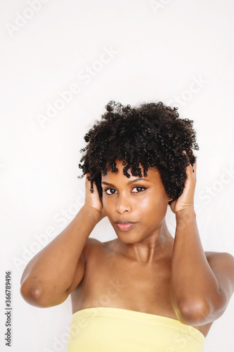 Young black woman with afro hair portrait