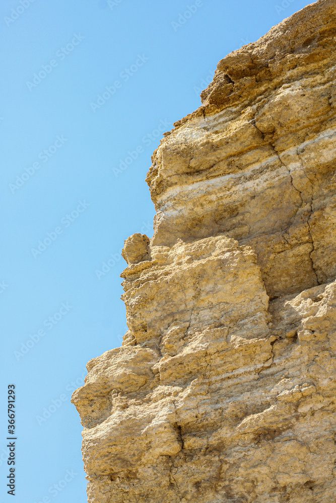 Yellow stone rock against  blue sky in the south of Ukraine. Leisure and vacation concept