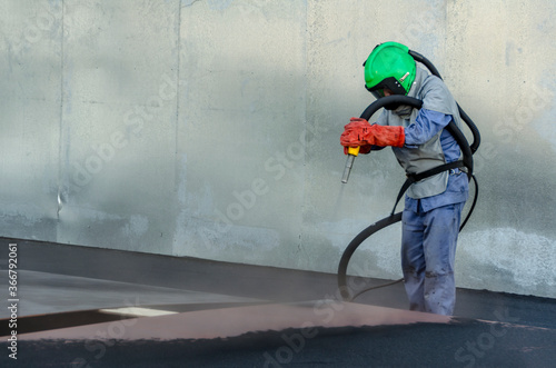 Принти на полотні Sandblasting process, industrial worker