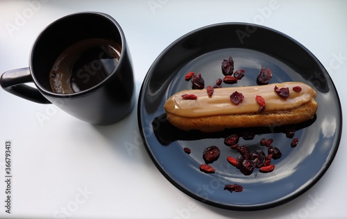 Homemade delicious coffee and eclair