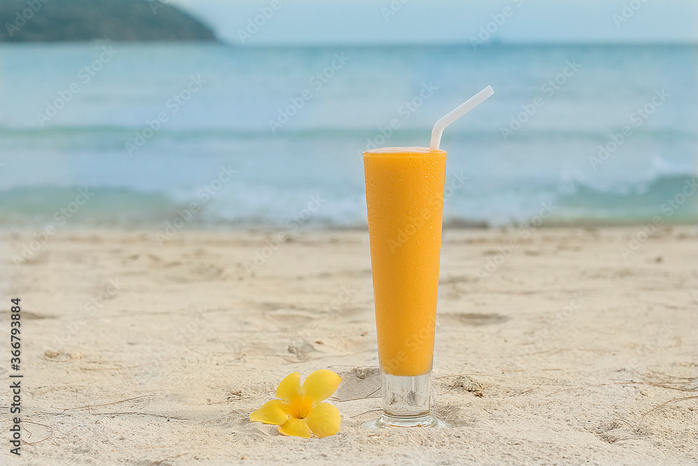 orange juice on the beach