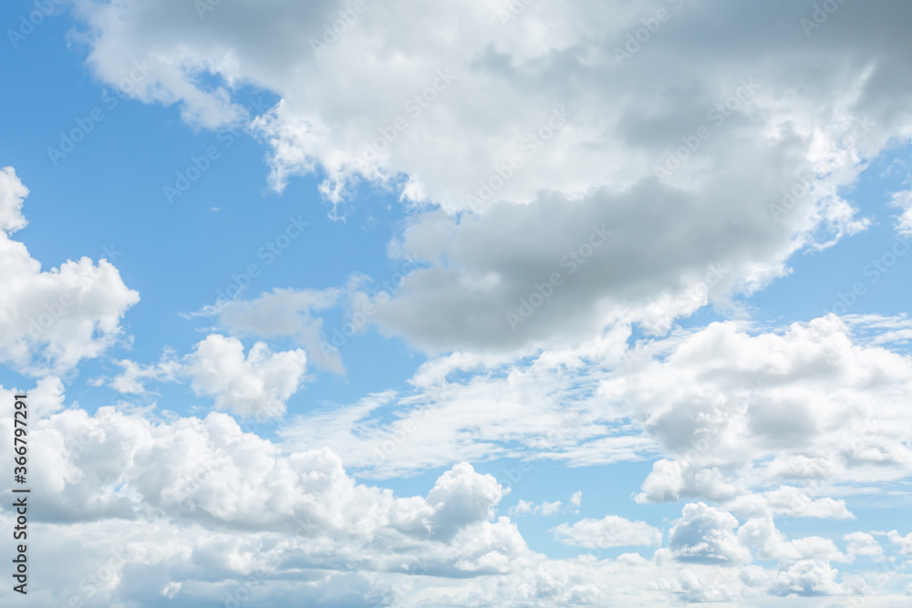 Cumulonimbus clouds in the blue sky. Vertical image. Cumulonimbus clouds in the blue sky. Vertical image.