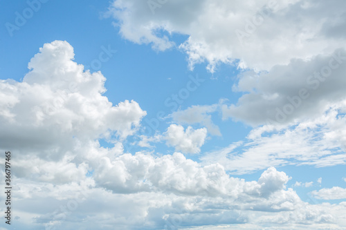 Fotografija Blue sky with lots of beautiful altostratus and cumulus clouds.