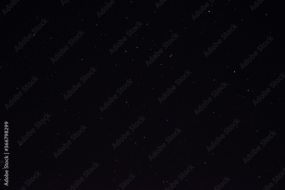 Space background on the desktop, screensaver. Night starry sky of the Northern hemisphere. Various cosmic bodies and constellations. The stars are like small bright lights.