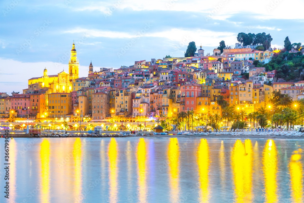 Menton mediaeval town on the French Riviera in the Mediterranean during sunset, France.
