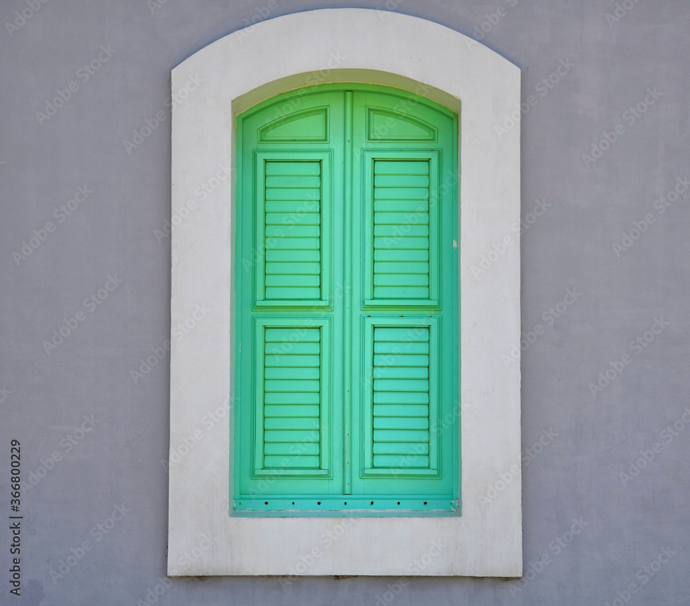 Colorful abstract painted window shutter architectural detail on the Cabo Rojo, Puerto Rico lighthouse Colorful abstract painted window shutter architectural detail on the Cabo Rojo, Puerto Rico lighthouse