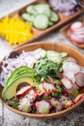 colorful octopus poke bowl with vegetables