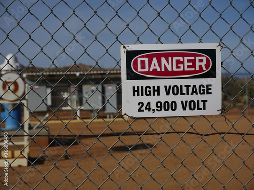 High voltage sign at an industrial complex