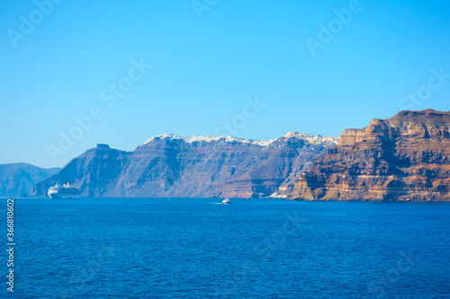 Aegean Sea with Santorini shore and Fira town