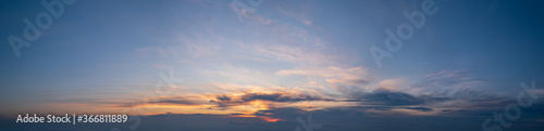 Sunset dusk sky with clouds (high resolution wide background panorama). © wildman