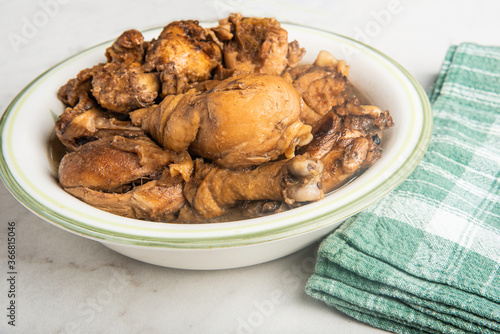 Filipino-Style Chicken Adobo Dish In Serving Bowl