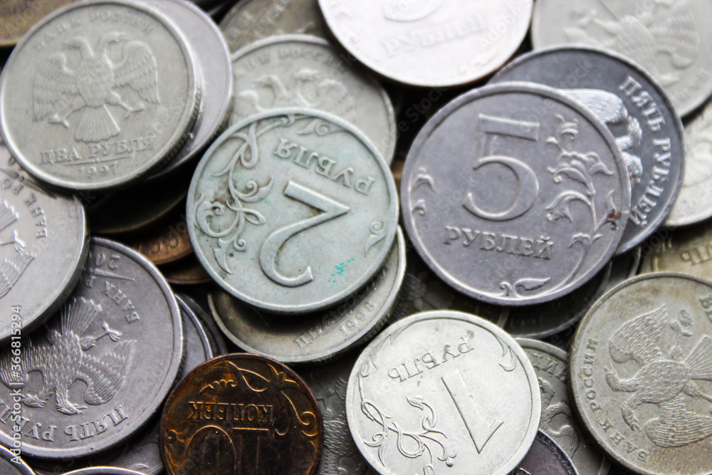 Russian iron rubles in a pile. Russian currency. Background rubles. A scattering of coins. A lot of Russian rubles. Iron money background. Finance, business, investment concept. Russian iron rubles in a pile. Russian currency. Background rubles. A scattering of coins. A lot of Russian rubles. Iron money background. Finance, business, investment concept.