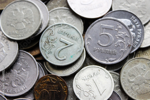 Russian iron rubles in a pile. Russian currency. Background rubles. A scattering of coins. A lot of Russian rubles. Iron money background. Finance, business, investment concept.