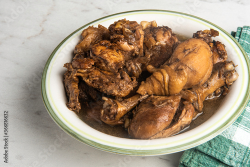 Filipino-Style Chicken Adobo Dish In Serving Bowl
