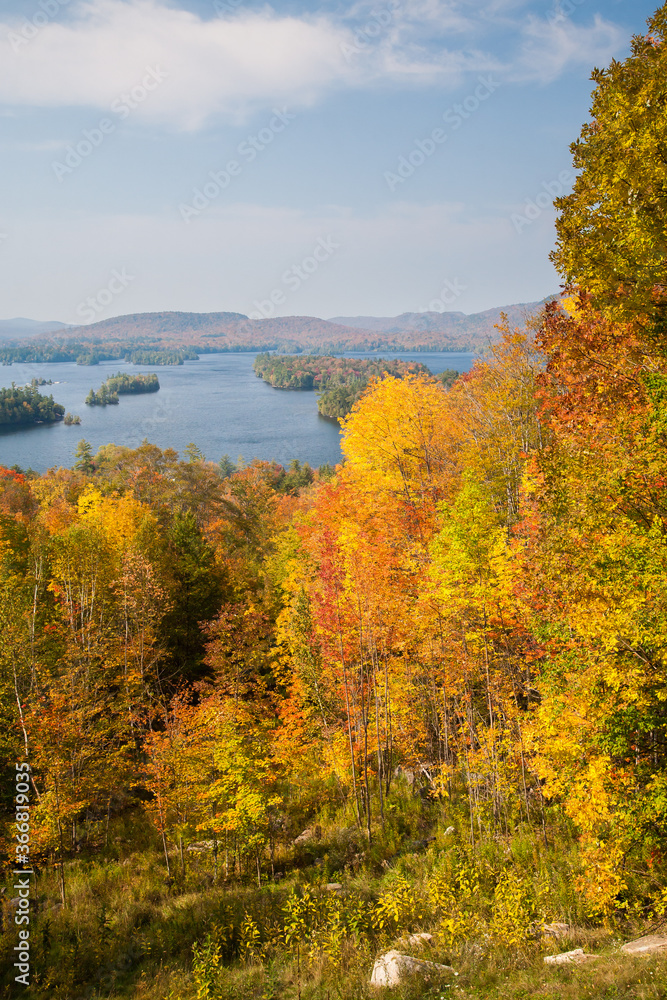 View of autumn leaves and Lake Ontario on the west portion of Adirondack national Park near Alexandria Bay, NY.