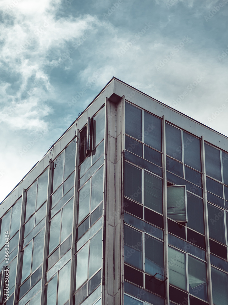 Fototapeta premium Business building with stormy clouds above