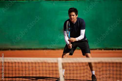 tennis player waiting for the tennis ball to arrive © kevin