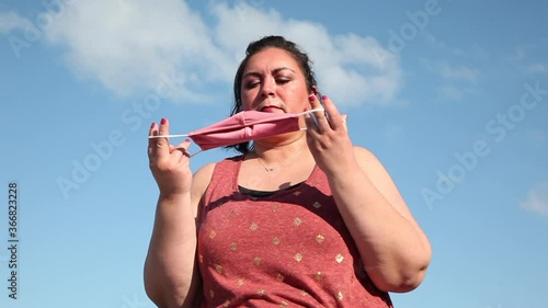 Trying to put mask on