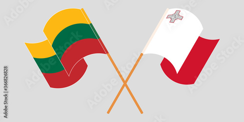 Crossed and waving flags of Malta and Lithuania