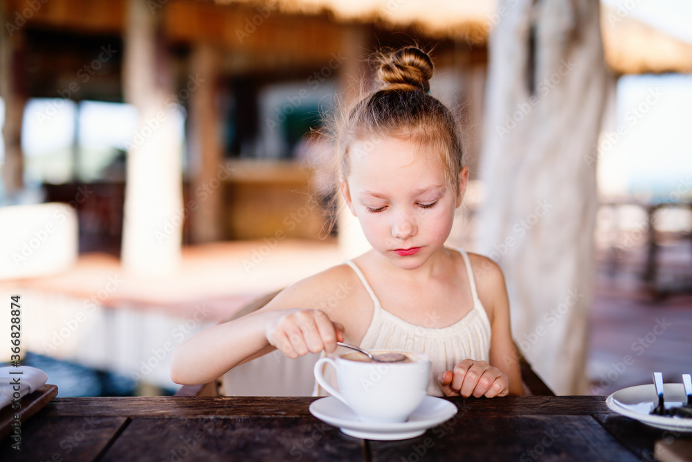 Little girl drinking hot chocolate Little girl drinking hot chocolate
