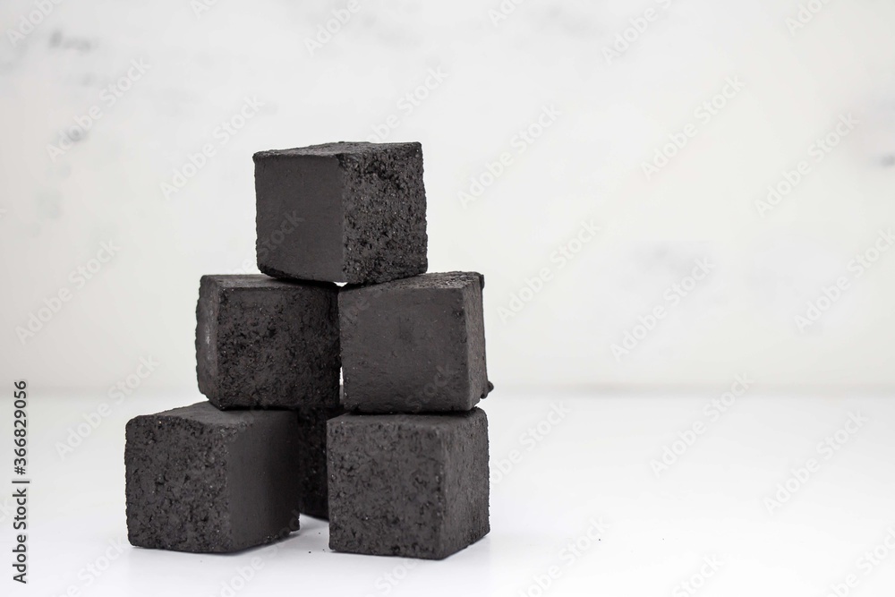 Coconut Charcoal For Hookah on white background Coconut Charcoal For Hookah on white background