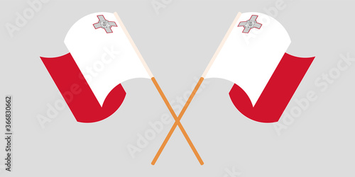 Crossed and waving flags of Malta