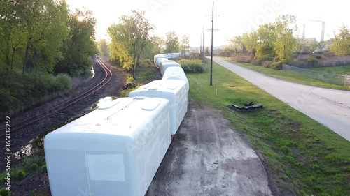 Wind Turbine Nacelle And Hub For Transporting By A Train In Monroe, Michigan - drone shot photo