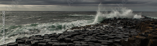 Waves crashing on the Giant's Causeway, Causeway Coast, County Antrim, Northern Ireland