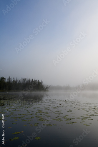 Early morning fog over a Michigan lake © renee