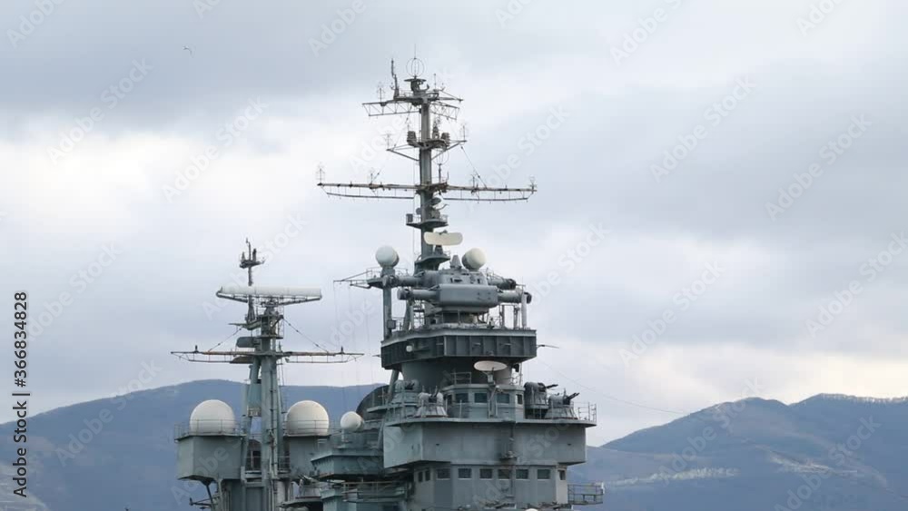 Many antennas, radars and echo sounding systems on a warship Many antennas, radars and echo sounding systems on a warship