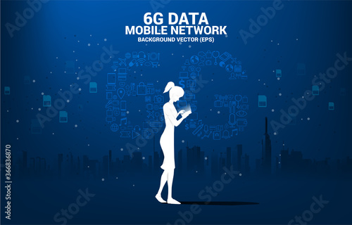 Silhouette woman with mobile phone and 6G Data technology from online function icon. Concept for mobile telecommunication global network.