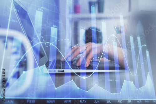 Double exposure of woman hands typing on computer and forex chart hologram drawing. Stock market invest concept.