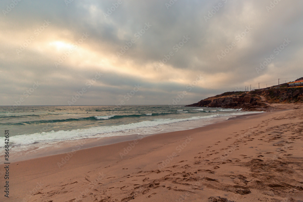 Dramatic sky at Sao Juliao beach, Sintra, portugal.