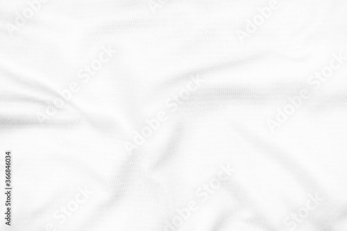 Abstract white fabric texture background. Wavy white cloth.