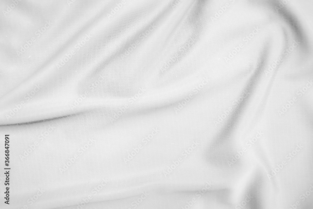Fototapeta premium Abstract white fabric texture background. Wavy white cloth.