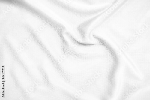 Abstract white fabric texture background. Wavy white cloth.