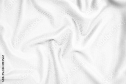 Abstract white fabric texture background. Wavy white cloth.