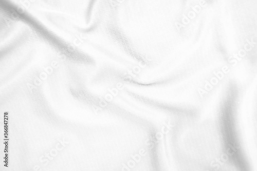 Abstract white fabric texture background. Wavy white cloth.