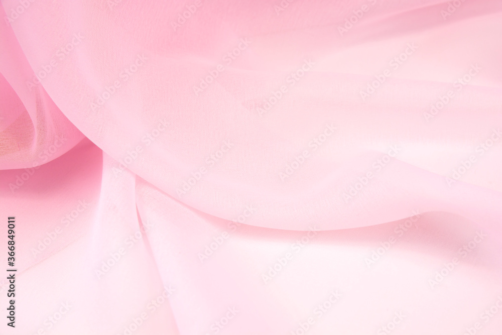 Pink satin fabric with delicate curves Pink satin fabric with delicate curves