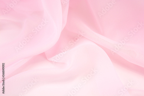 Pink satin fabric with delicate curves