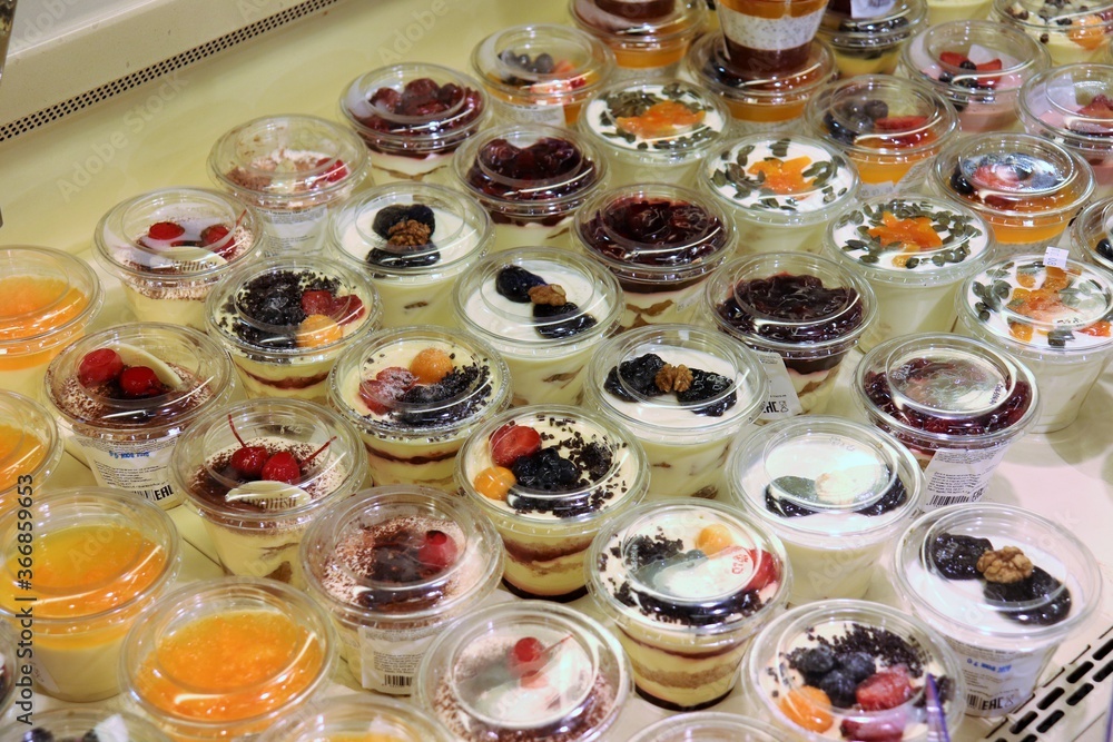 Sweet chilled desserts and cake on a supermarket showcase
Sweet chilled desserts and cake on a supermarket showcase