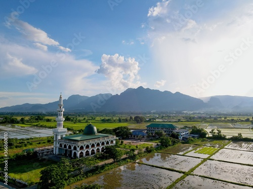 The Abu Bakr Mosque is located in the rice fields of Chiang Rai's Mae Sai District in Northern Thailand photo