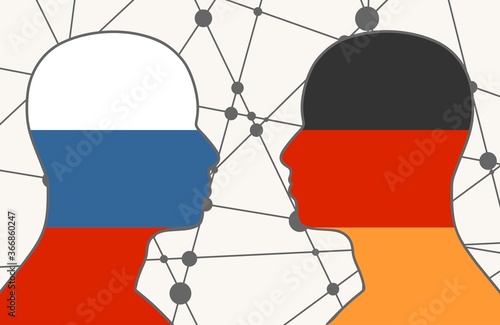 Image relative to politic and economic relationship between Russia and Germany. National flags inside the heads of the businessmen. Teamwork concept.